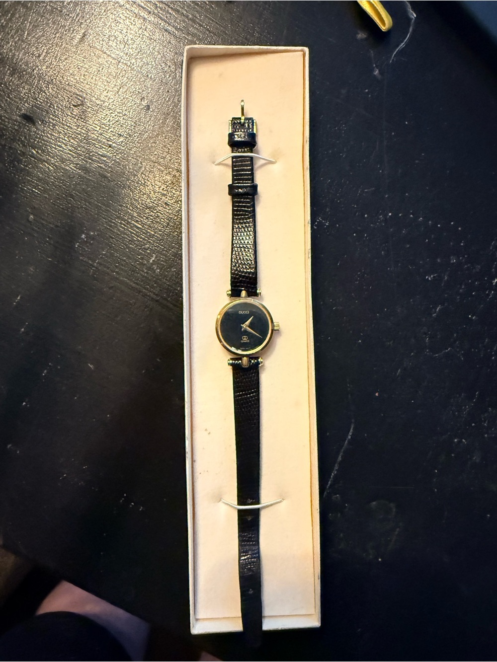 Gucci Black and Gold Round Dial Women’s Dress Watch